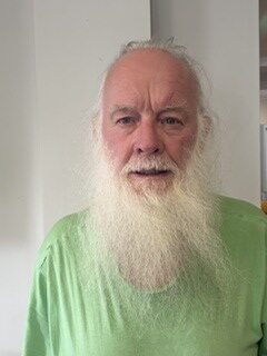 man posing for staff photo